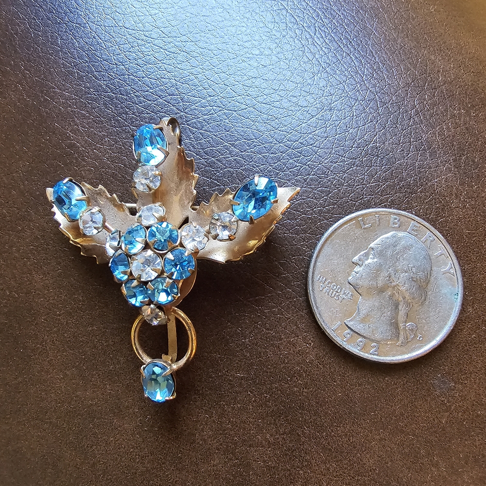 Vintage gold-Tone Blue Crystal Leaf Brooch with Clear Accents